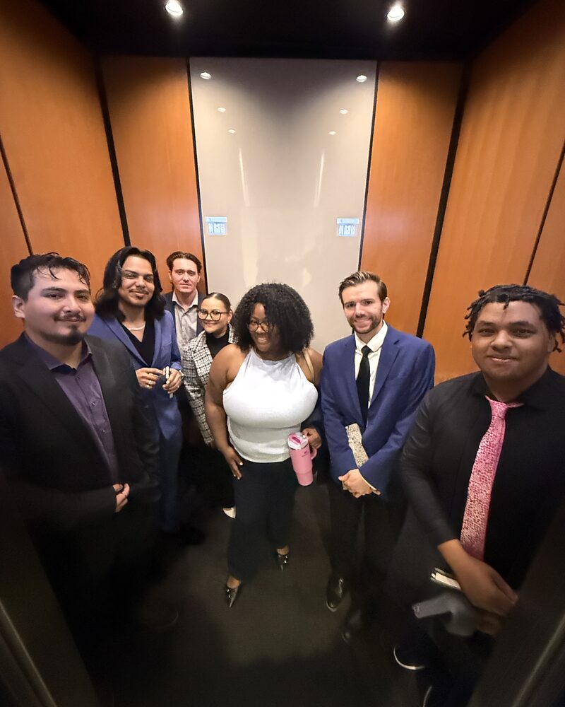 Edge Marketing Agency team members in business attire heading out to the field