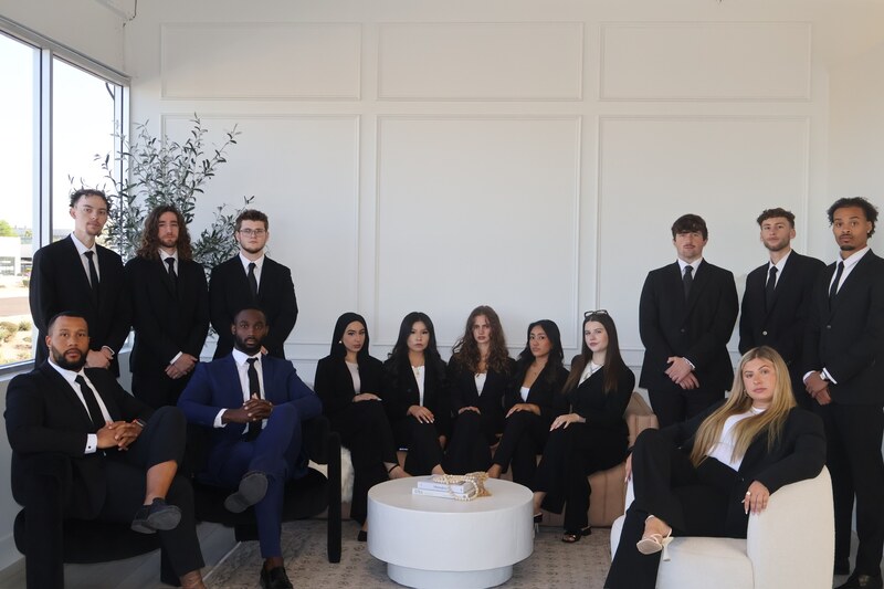 Edge Marketing Agency team members seated and standing together in a bright office lounge